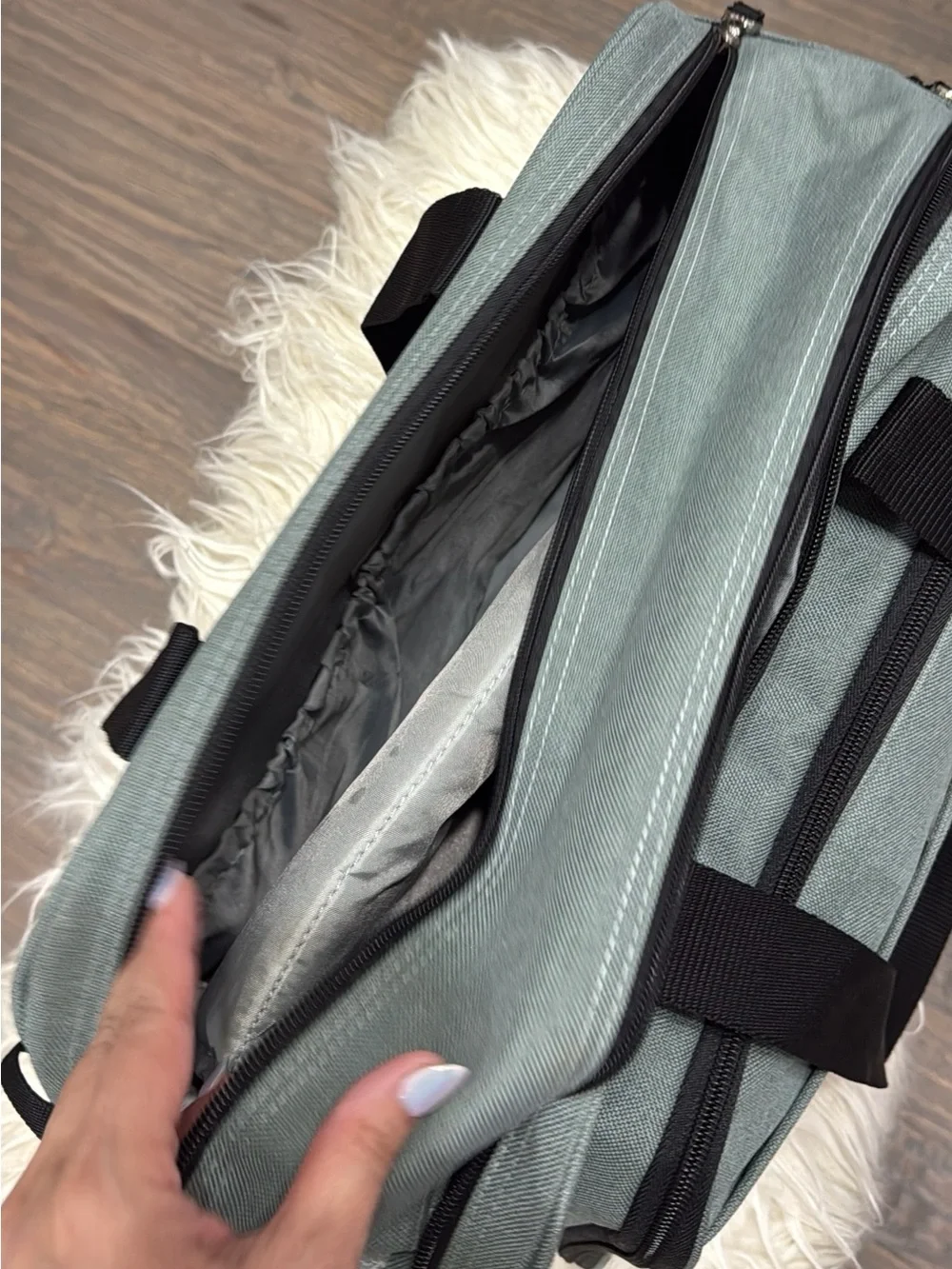 Diaper duffel bag with sleeping section for baby